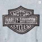 Hellblaue Harley Davidson Jeansbluse mit Reißverschluss vorne und Bar & Shield Emblem auf der Rückseite.